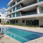 Punta Cana Village modern two-bedroom condo for sale is approximately a five-minute drive from the beach 18 Screenshot 8