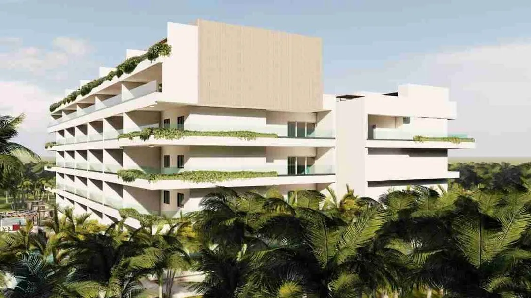 Modern two bedroom condo for sale in Punta Cana with a jacuzzi and pool views. 1