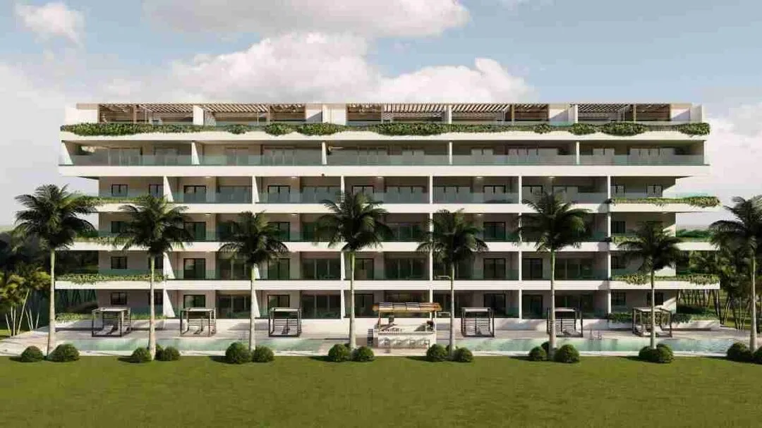 Modern two bedroom condo for sale in Punta Cana with a jacuzzi and pool views. 11 1