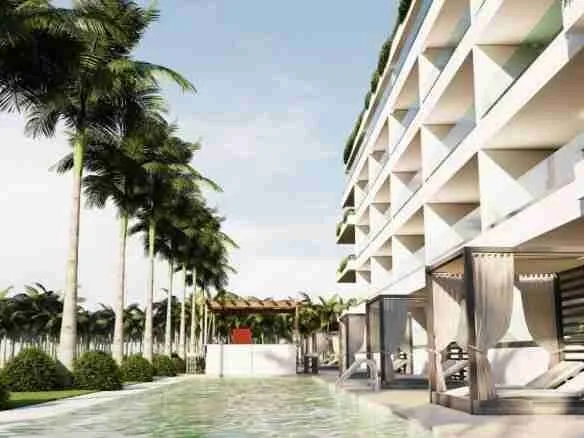 Modern two bedroom condo for sale in Punta Cana with a jacuzzi and pool views. 7 1