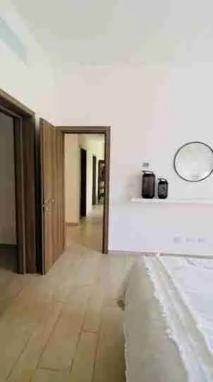 Panorama views of the golf course and pool from this corner apartment for sale at Punta Cana 10