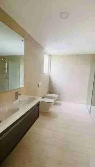 Panorama views of the golf course and pool from this corner apartment for sale at Punta Cana 11