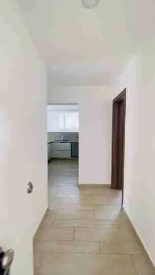 Panorama views of the golf course and pool from this corner apartment for sale at Punta Cana 13