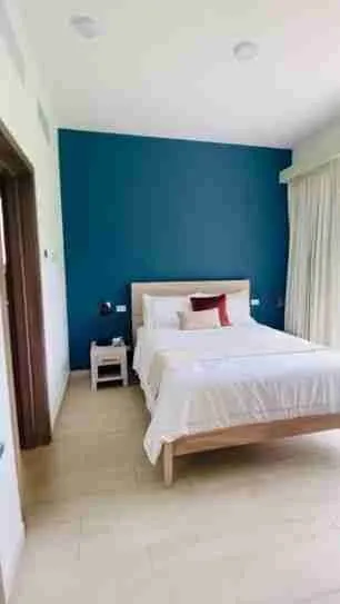 Panorama views of the golf course and pool from this corner apartment for sale at Punta Cana 5