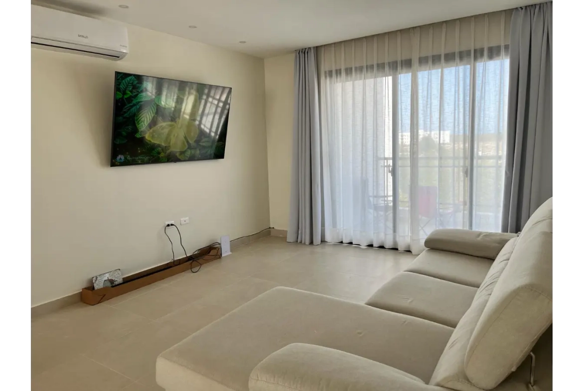 Residencias Palmeira: Apartamento de 2 dormitorios con vistas a la piscina en venta en Ciudad Las Canas, Cap Cana