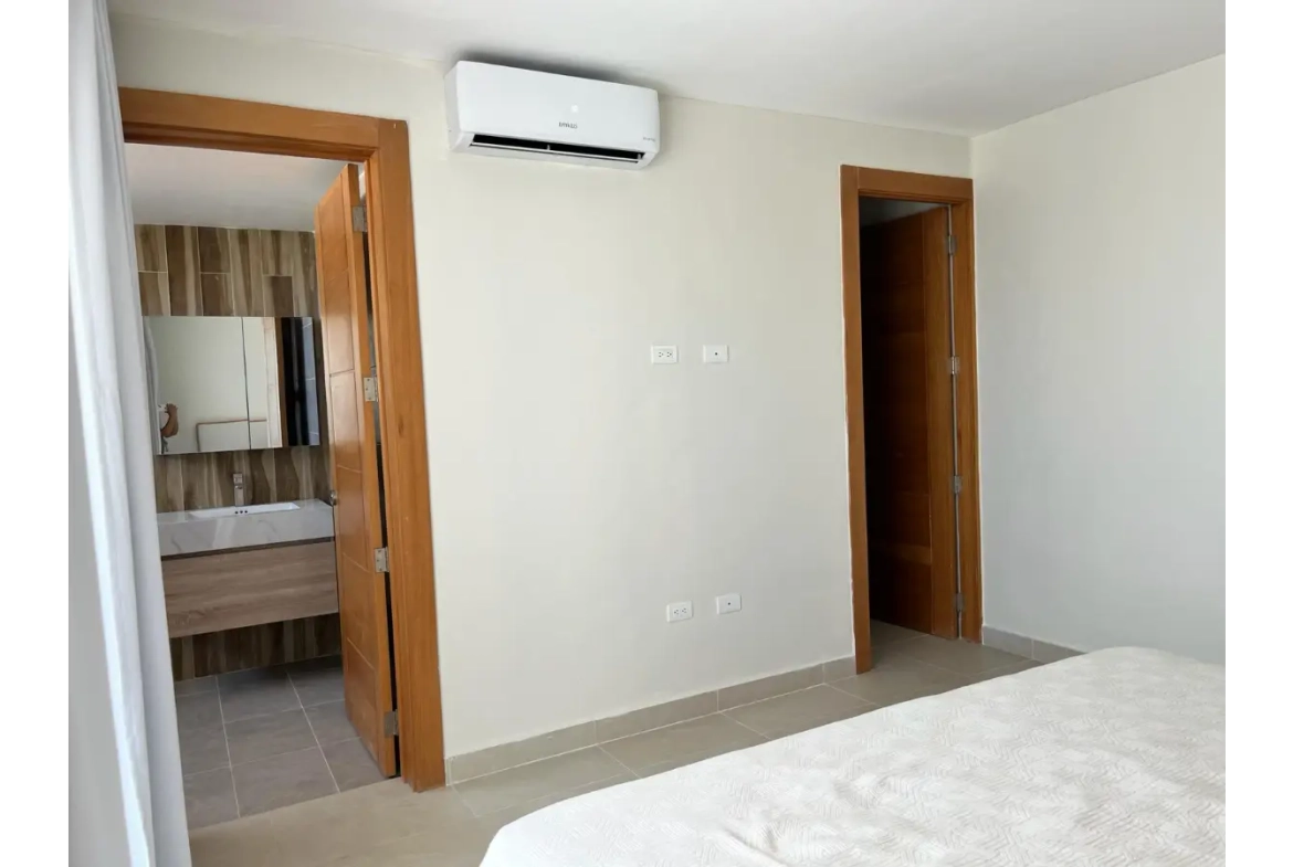 Residencias Palmeira: Apartamento de 2 dormitorios con vistas a la piscina en venta en Ciudad Las Canas, Cap Cana