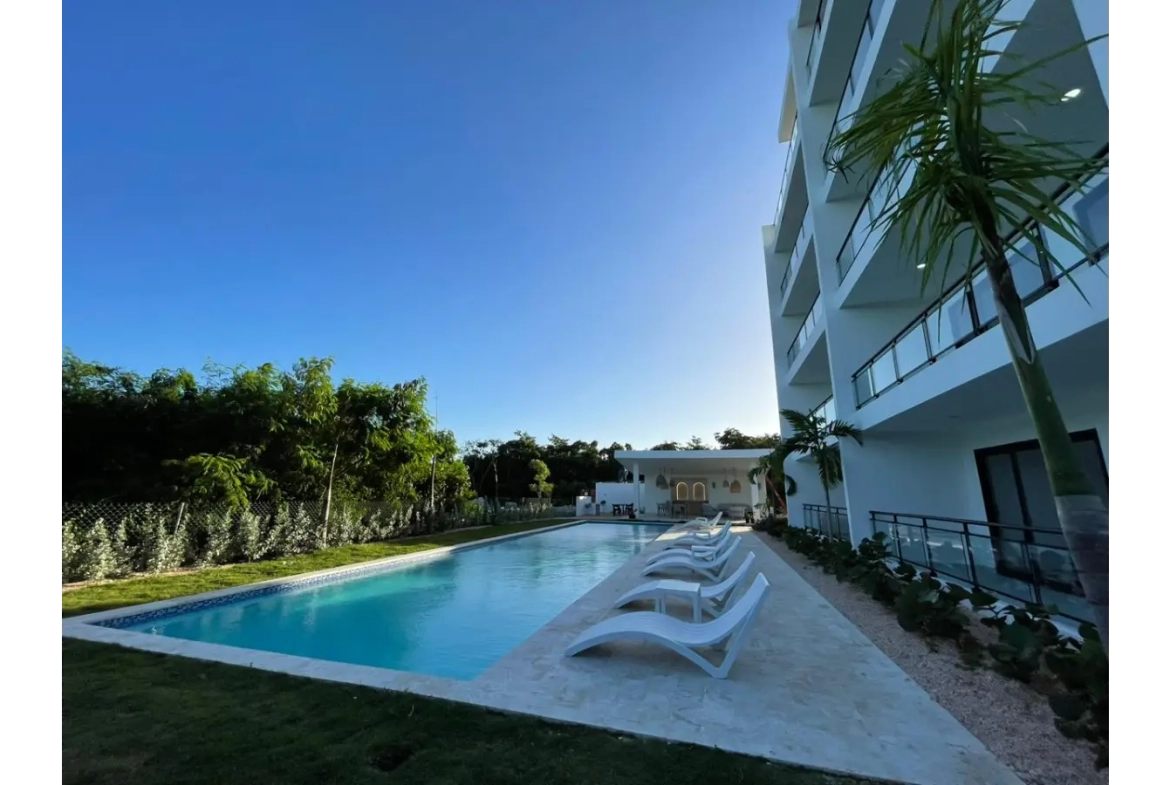 Residencias Palmeira: Apartamento de 2 dormitorios con vistas a la piscina en venta en Ciudad Las Canas, Cap Cana