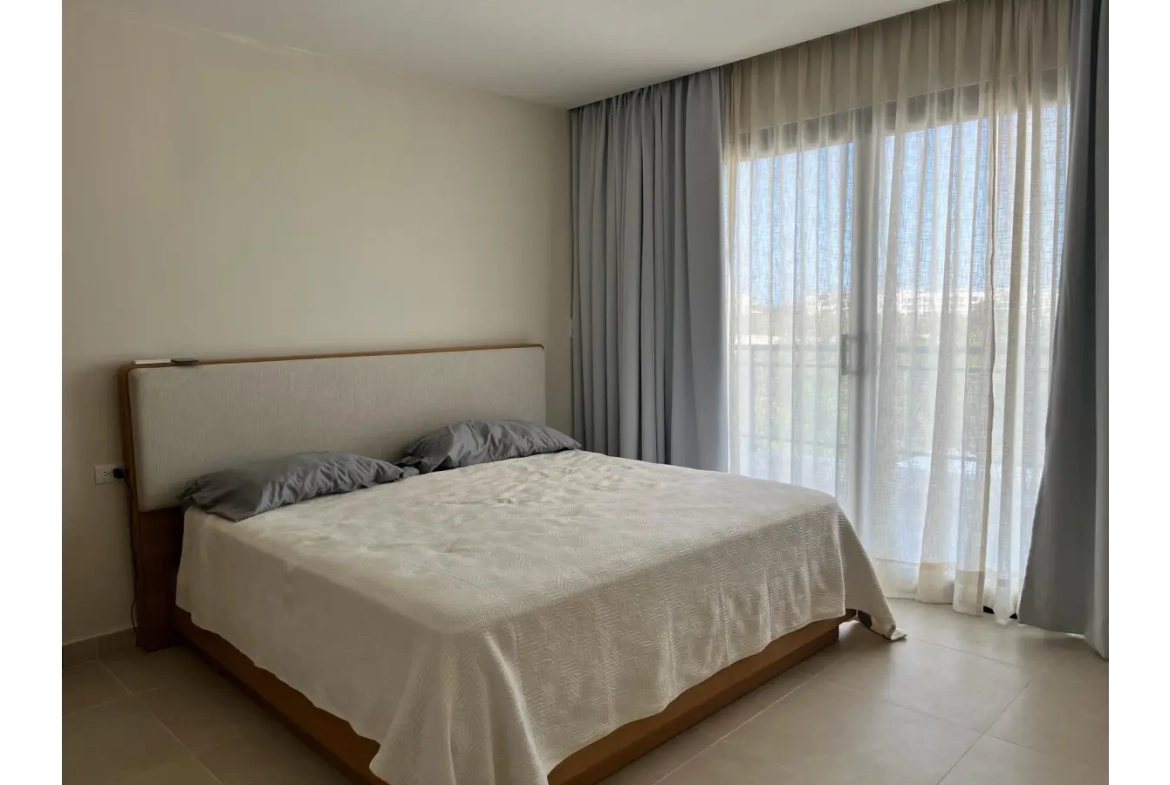Residencias Palmeira: Apartamento de 2 dormitorios con vistas a la piscina en venta en Ciudad Las Canas, Cap Cana