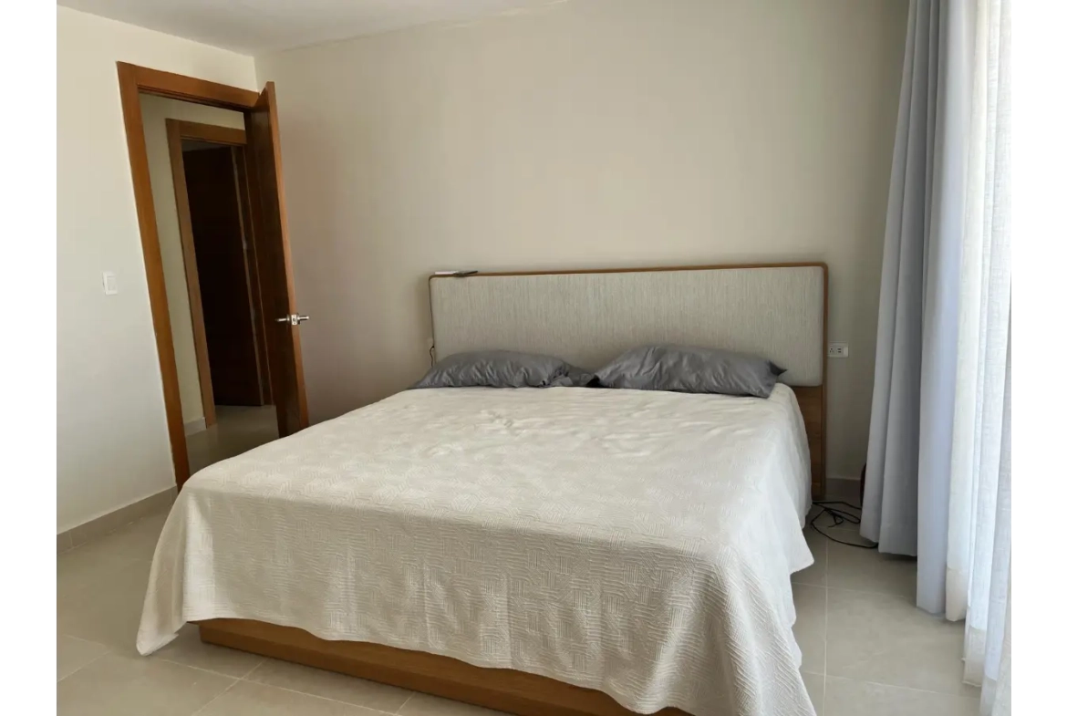 Residencias Palmeira: Apartamento de 2 dormitorios con vistas a la piscina en venta en Ciudad Las Canas, Cap Cana