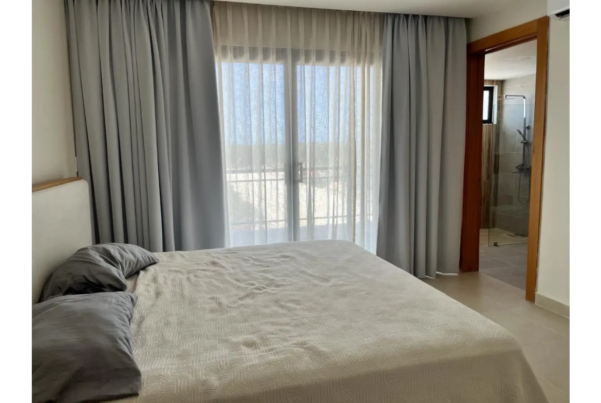 Residencias Palmeira: Apartamento de 2 dormitorios con vistas a la piscina en venta en Ciudad Las Canas, Cap Cana