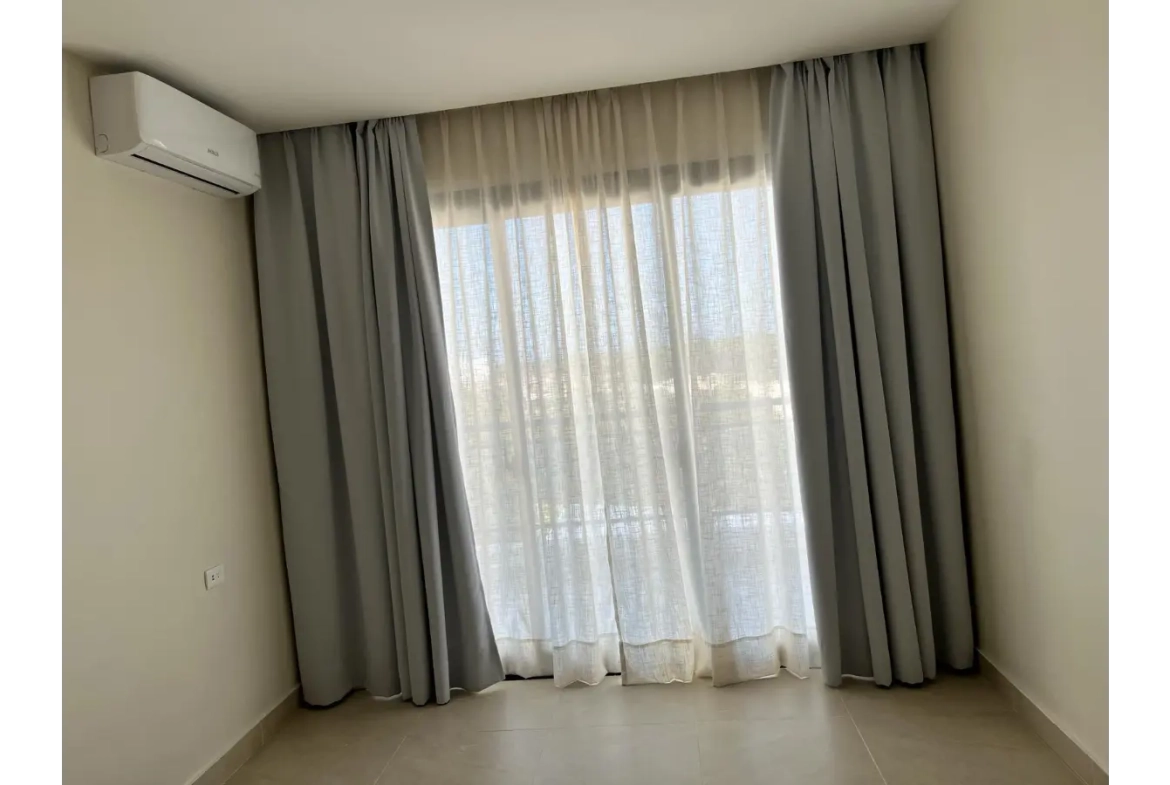 Residencias Palmeira: Apartamento de 2 dormitorios con vistas a la piscina en venta en Ciudad Las Canas, Cap Cana