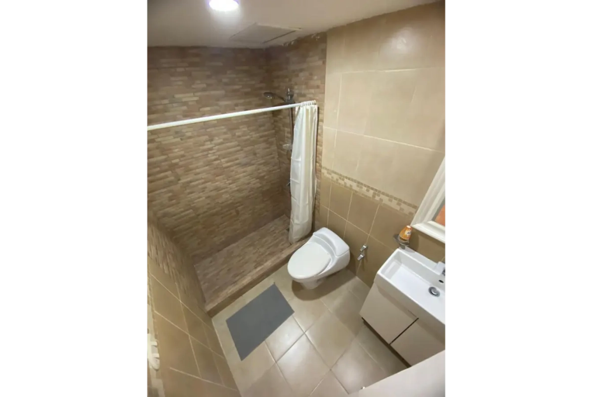 Arenas Blancas: Elegante Apartamento de Dos Dormitorios con Terraza en Venta en Punta Cana