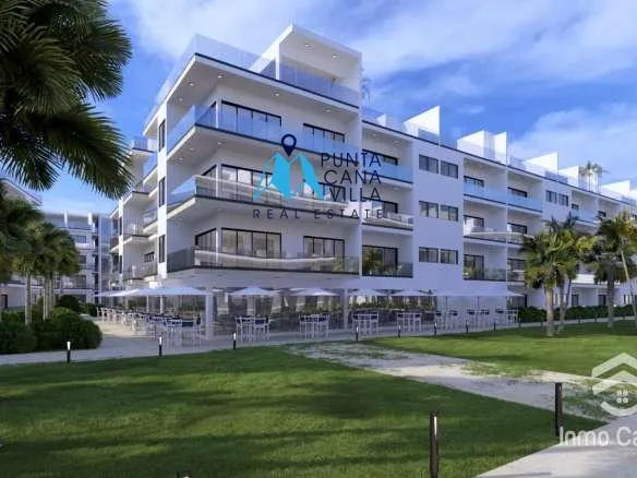 Modern 2-bedroom beachfront condo with balcony at Ocean Paradise Uvero Alto Punta Cana