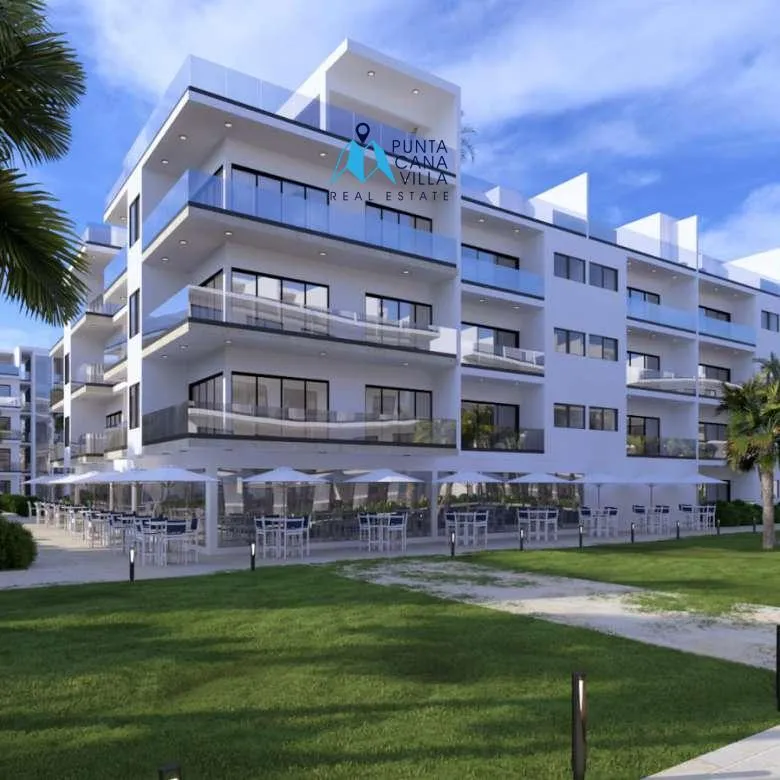 Modern 2-bedroom beachfront condo with balcony at Ocean Paradise Uvero Alto Punta Cana