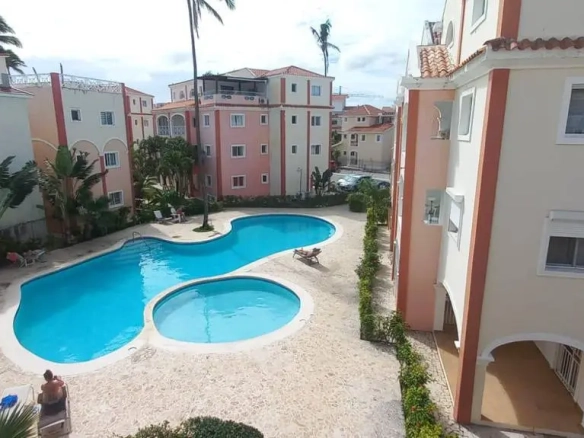 Furnished 1-bedroom apartment for sale in El-Dorado Los Corales Punta Cana with pool view balcony
