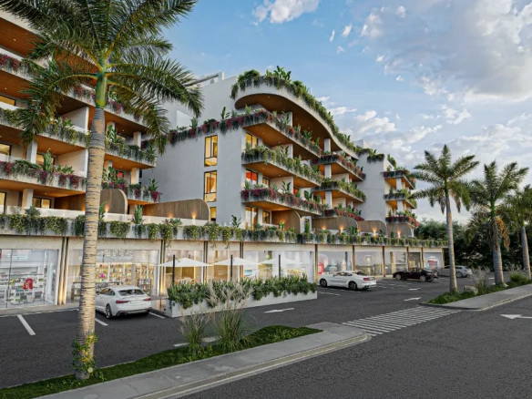 Palm Bayahibe Residences one‑bed penthouse balcony with jacuzzi overlooking pool and green areas in Bayahibe.