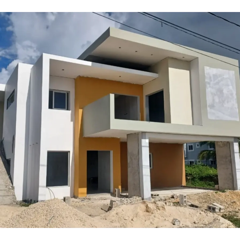 Modern 6 bedroom triplex home in Bavaro Punta Cana with private pool, balconies and double carport