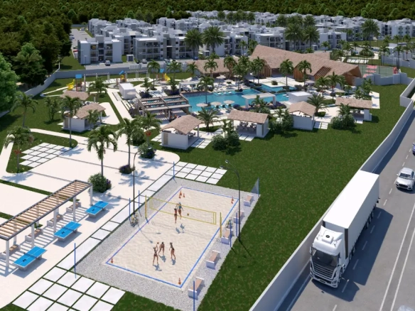 Los Robles Residences Bavaro condo de 3 chambres à vendre dans une communauté fermée avec piscine, gymnase extérieur, terrain de sport et zones pour animaux de compagnie.