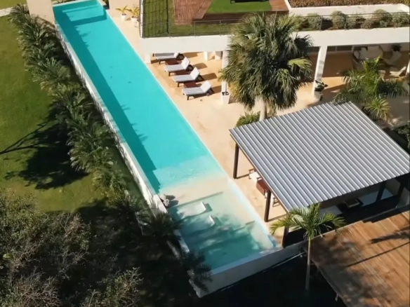 Villa Noah El Limon Samana six bedroom oceanfront luxury villa with semi Olympic infinity pool terrace tropical gardens and direct beach access