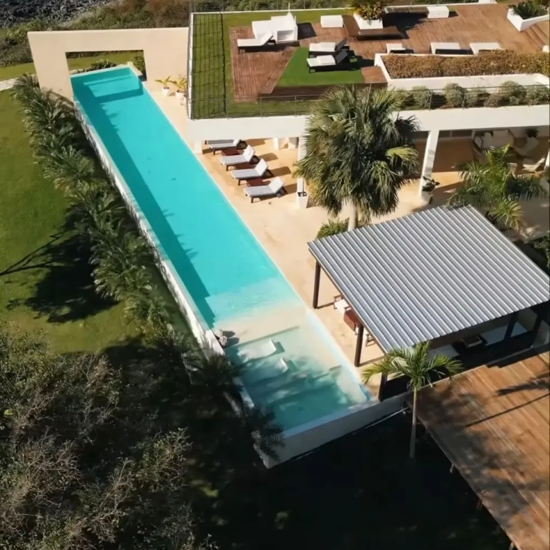 Villa Noah El Limon Samana six bedroom oceanfront luxury villa with semi Olympic infinity pool terrace tropical gardens and direct beach access
