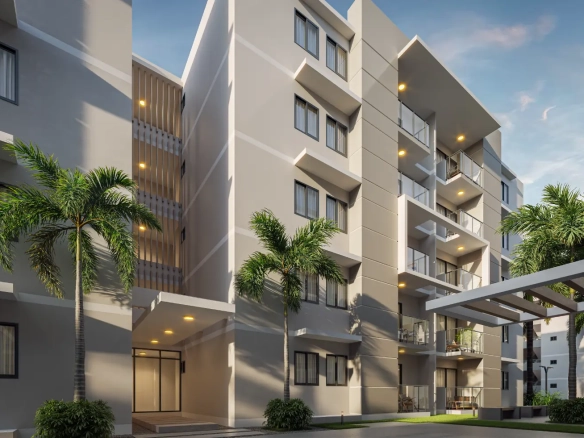 Bavaro Island II Smart Apartment for sale in Punta Cana featuring resort pool and tropical landscaping.
