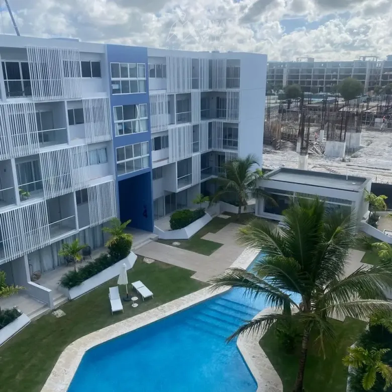 Kasa Residences 2 Bedroom Condo for sale in Downtown Punta Cana featuring open-concept living and modern kitchen.