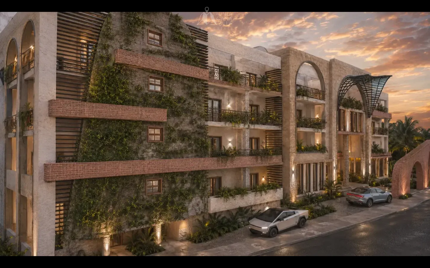 Exterior view of the Belara Cap Cana apartment building with lush landscaping
